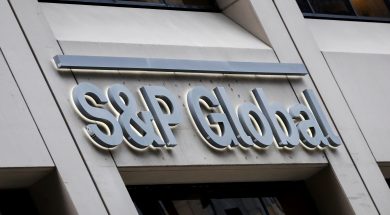 FILE PHOTO: The S&P Global logo is displayed on its offices in the financial district in New York